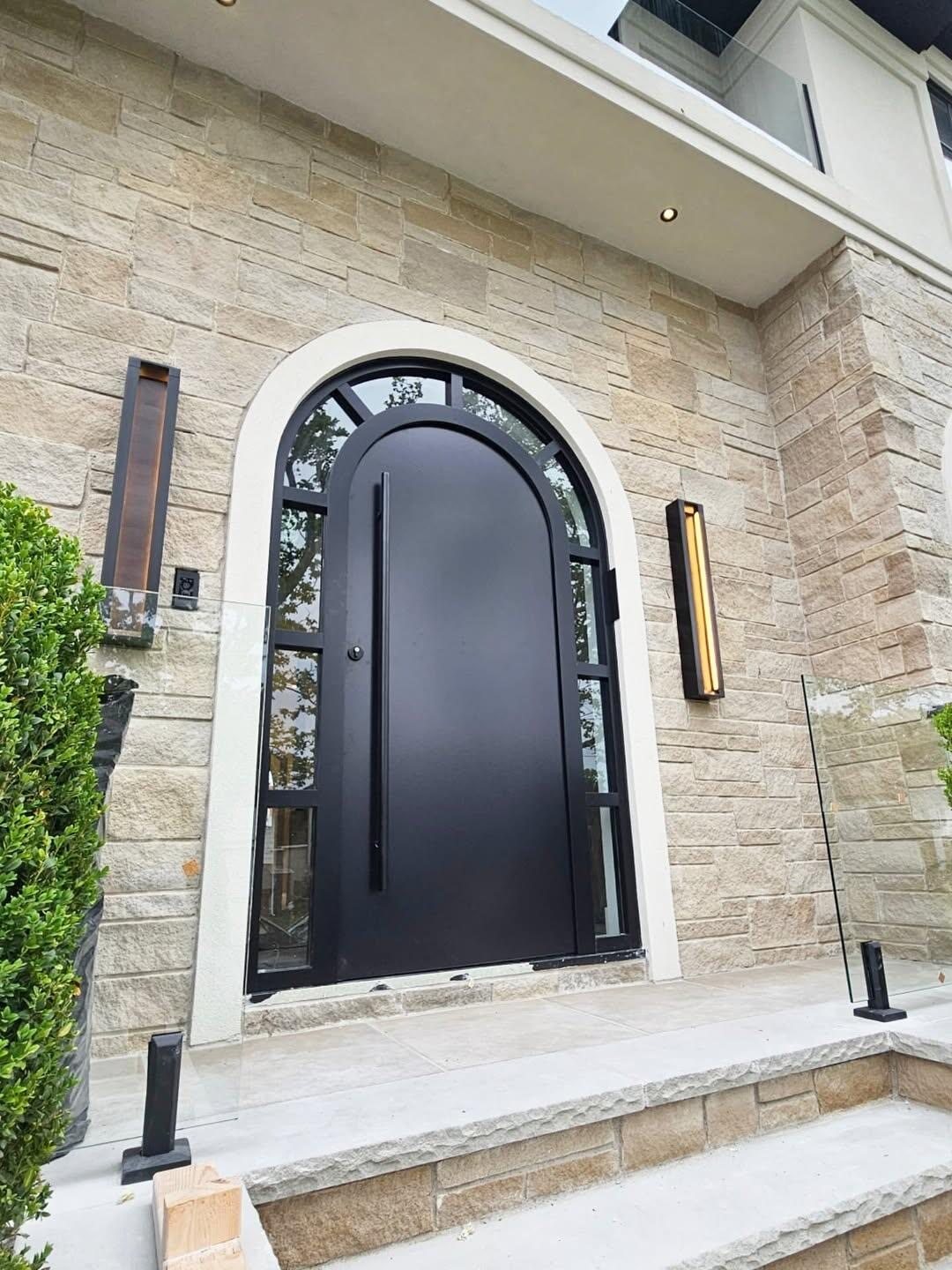 Arched black villa entrance design reference for a Kuwait project brief