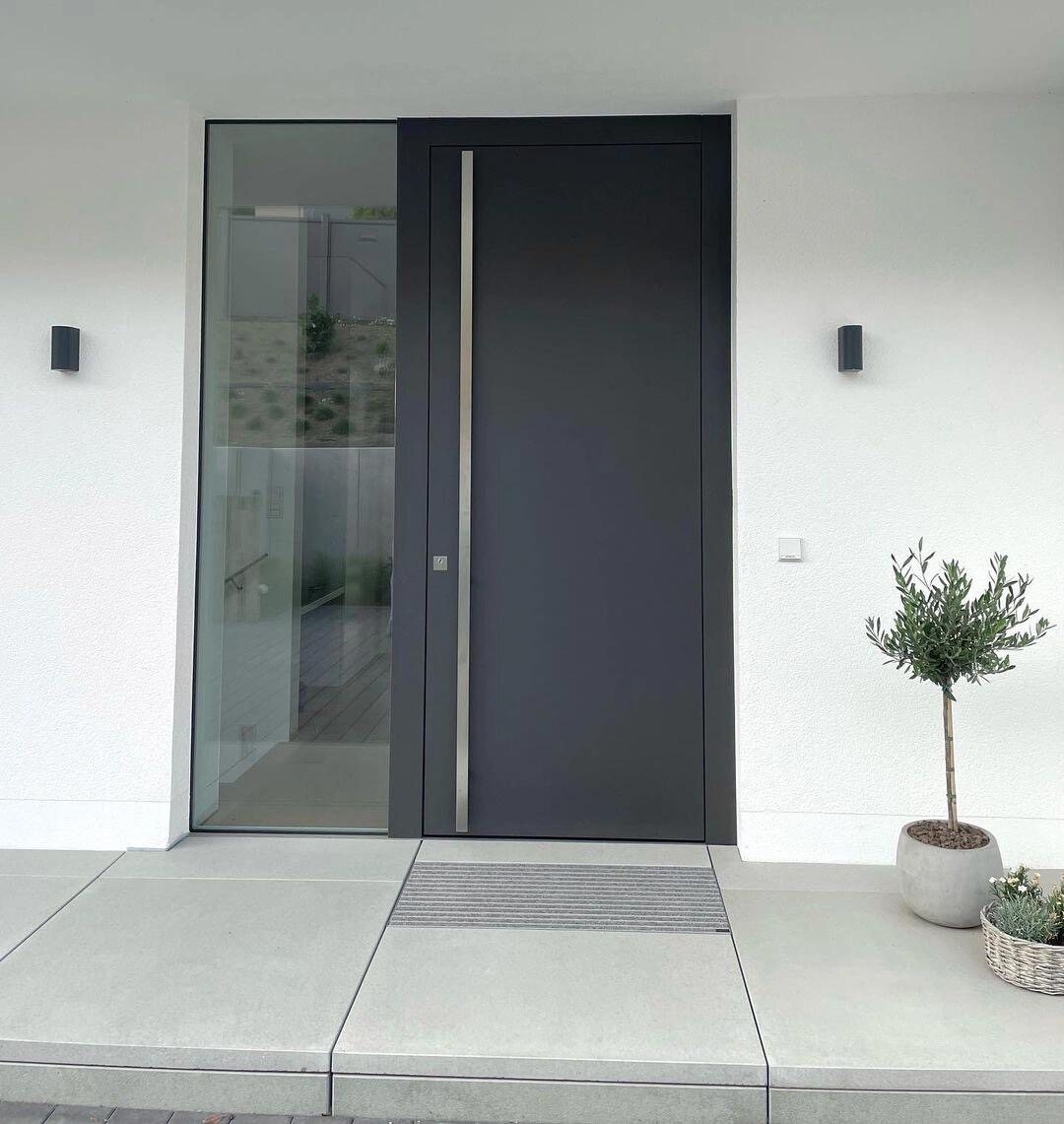 Modern entrance door with side glass for an architect security-assembly review