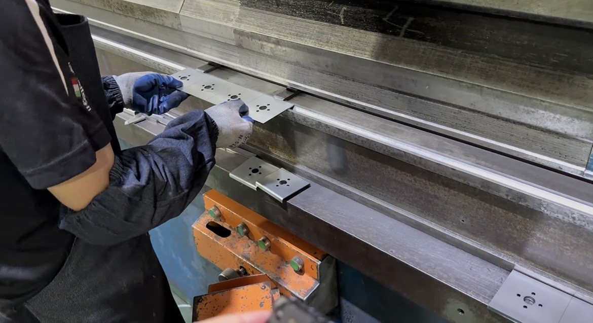 Precision door hardware processing in factory