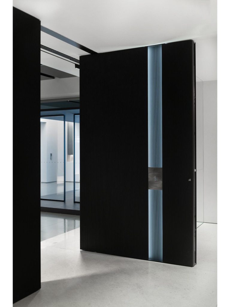 Black ribbed door with blue vertical accent strip
