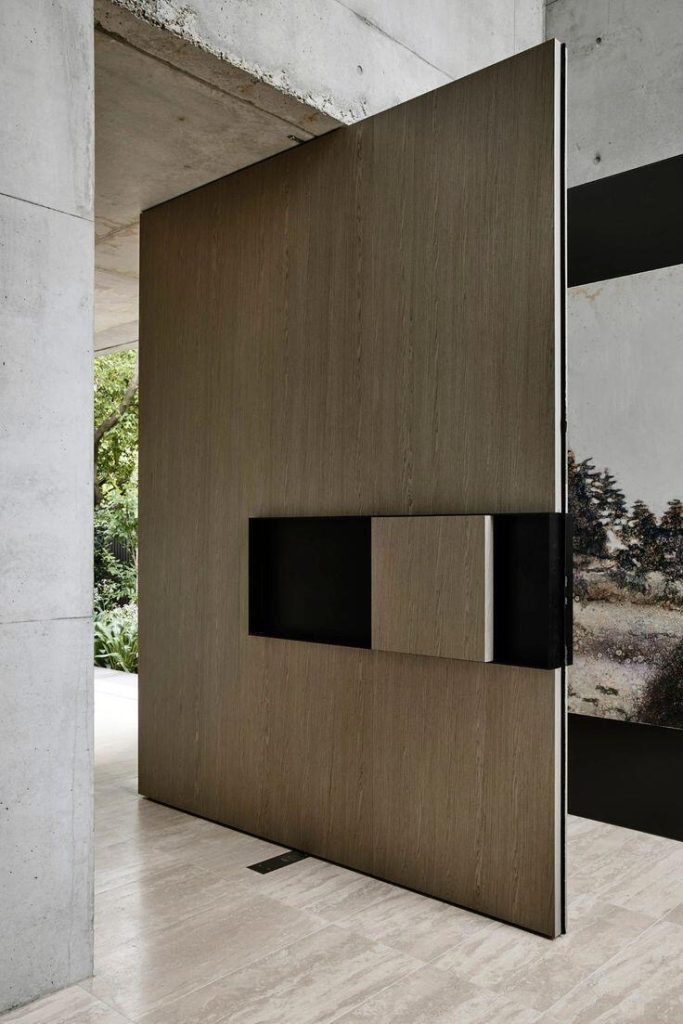 Wood-look door with deep recessed box pull