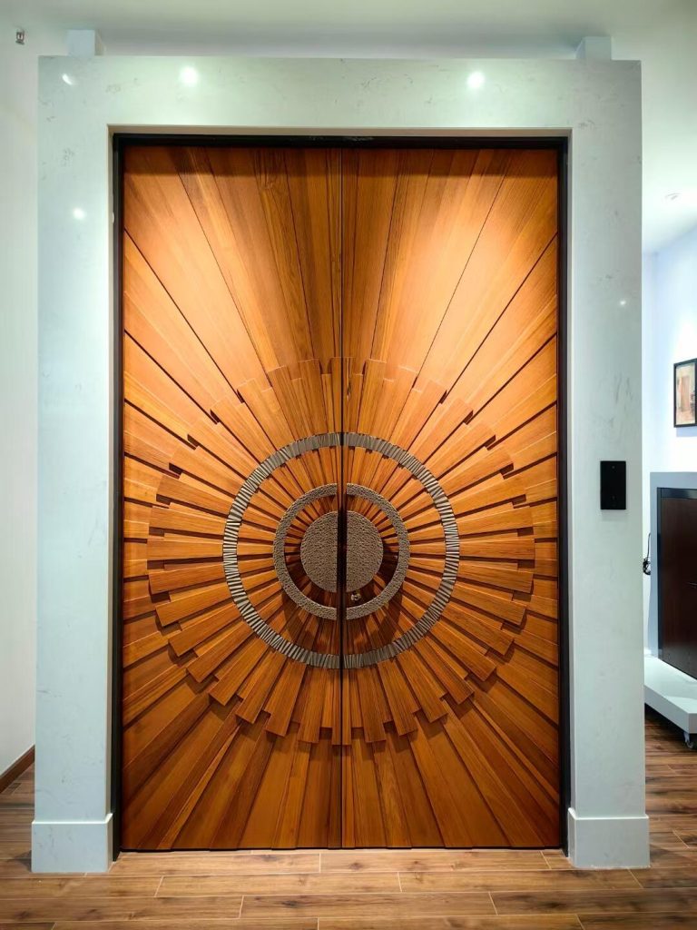 Warm wood-look double door with radiating sunburst pattern